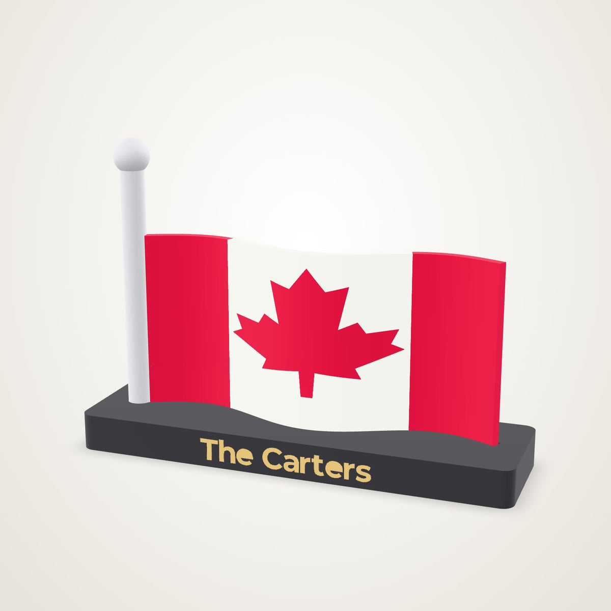 A rippling Canadian flag on a silver pole standing in a black plinth with The Carters in gold