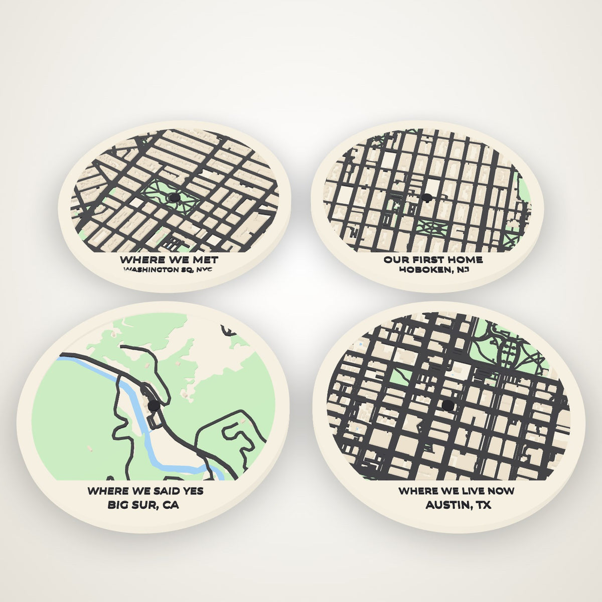 Four map coasters - where we met, our first home, where we said yes, where we live now - in the paper palette