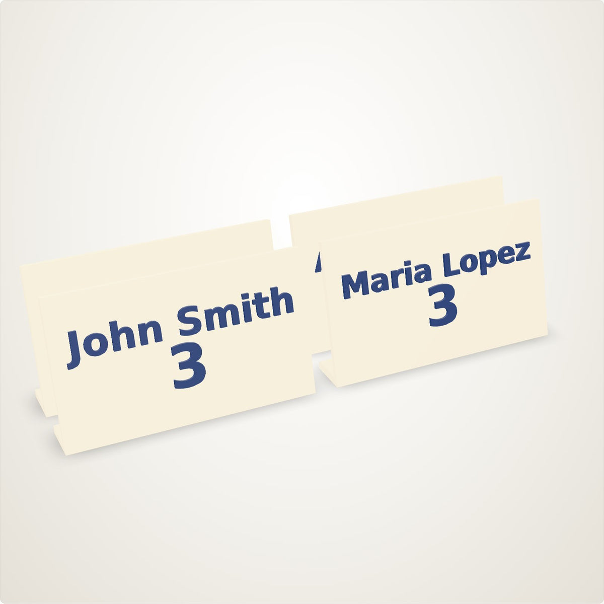 Custom place cards made from a guest list: ivory standing cards with names and table numbers in navy