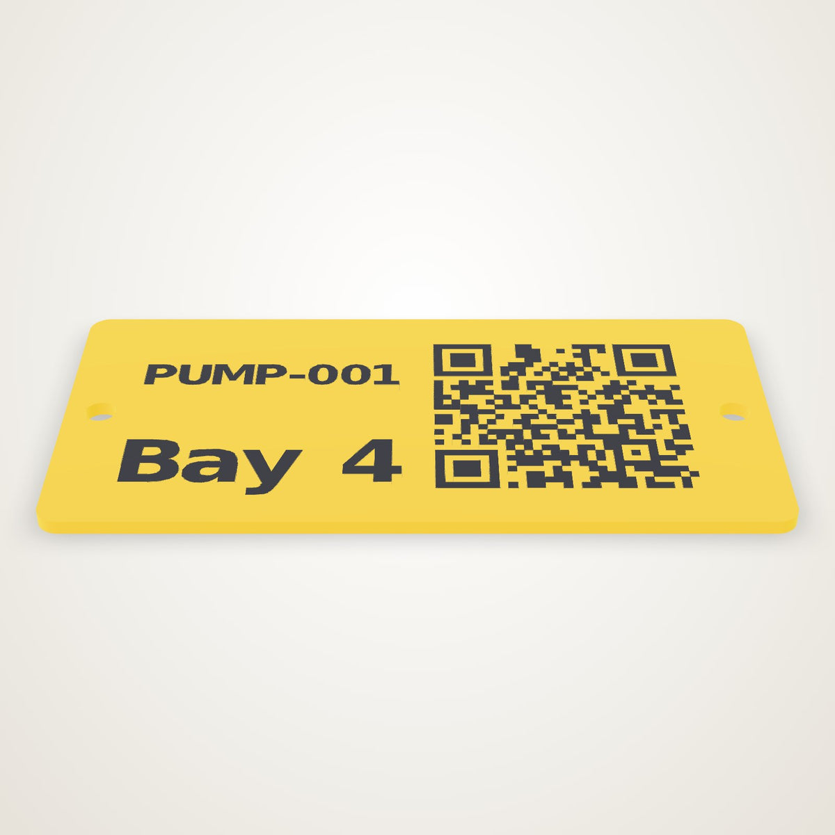 A yellow asset plate with PUMP-001, Bay 4 and a QR code inlaid in black, two screw holes