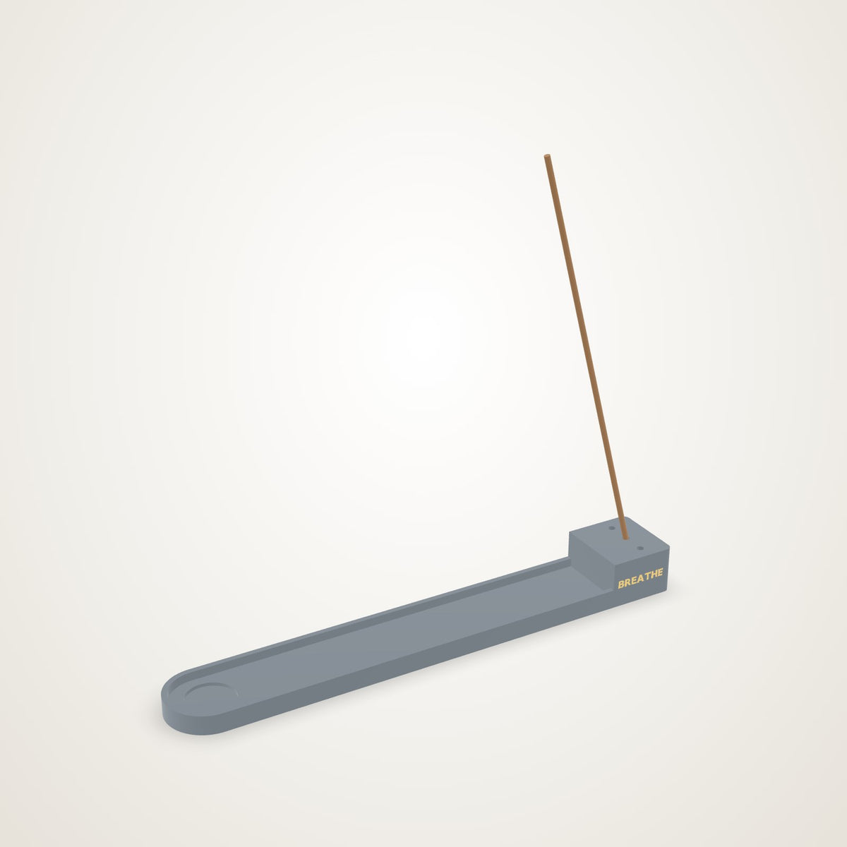 A slate stick incense holder boat with three stick holes and BREATHE set into the block in gold